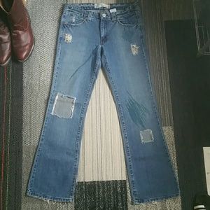 Levis Distressed 518 Superlow Bootcut jeans